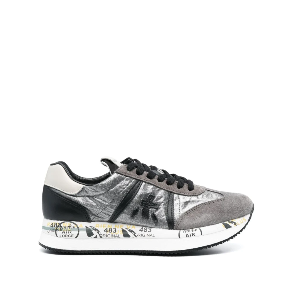 Graue Sneaker mit Paneln und Schnürung